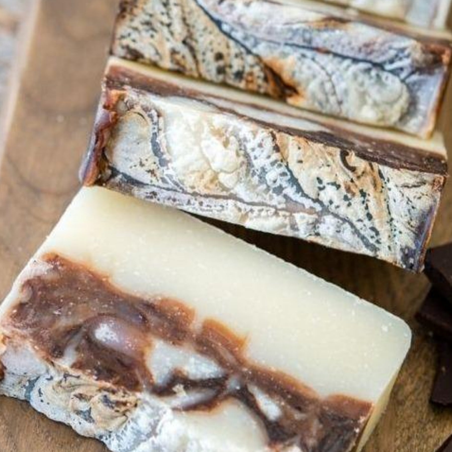 Close up of Moxxie's handcrafted, all natural Chocolate Mint bar soap for hand and body