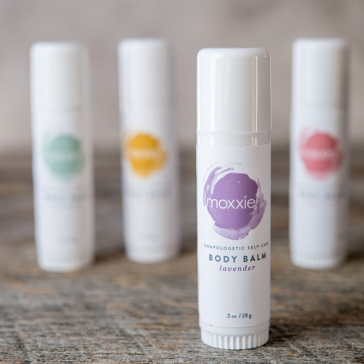 Moxxie's all natural, handcrafted, lavender solid lotion body balm in a convenient push up stick.