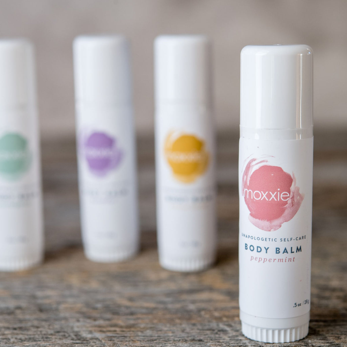 all natural, plant-ingredient, essential oil peppermint body balm solid lotion and moisturizing stick