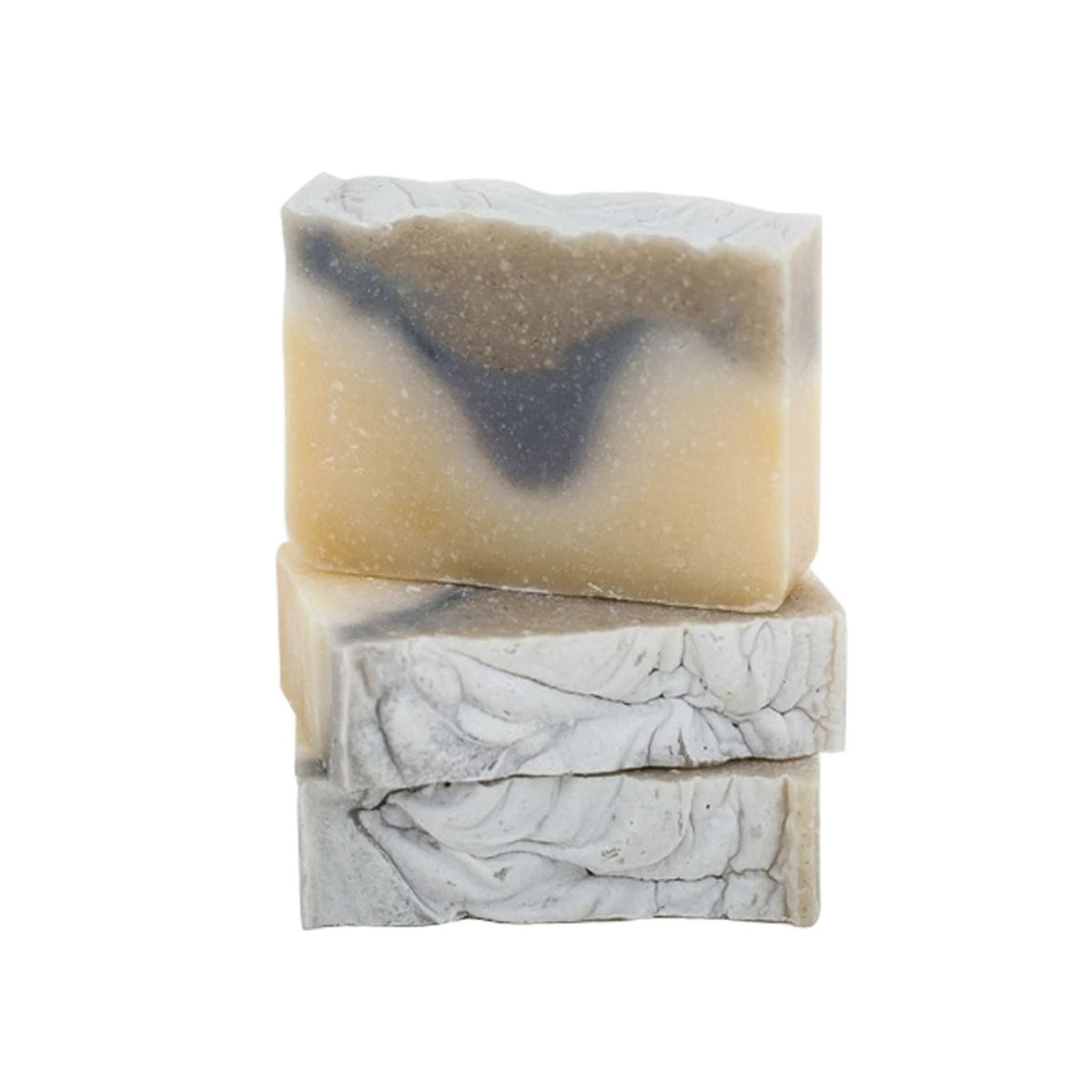 Stack of Lavender and Eucalyptus bar soaps, showing their marbled tan, blue and cream textures