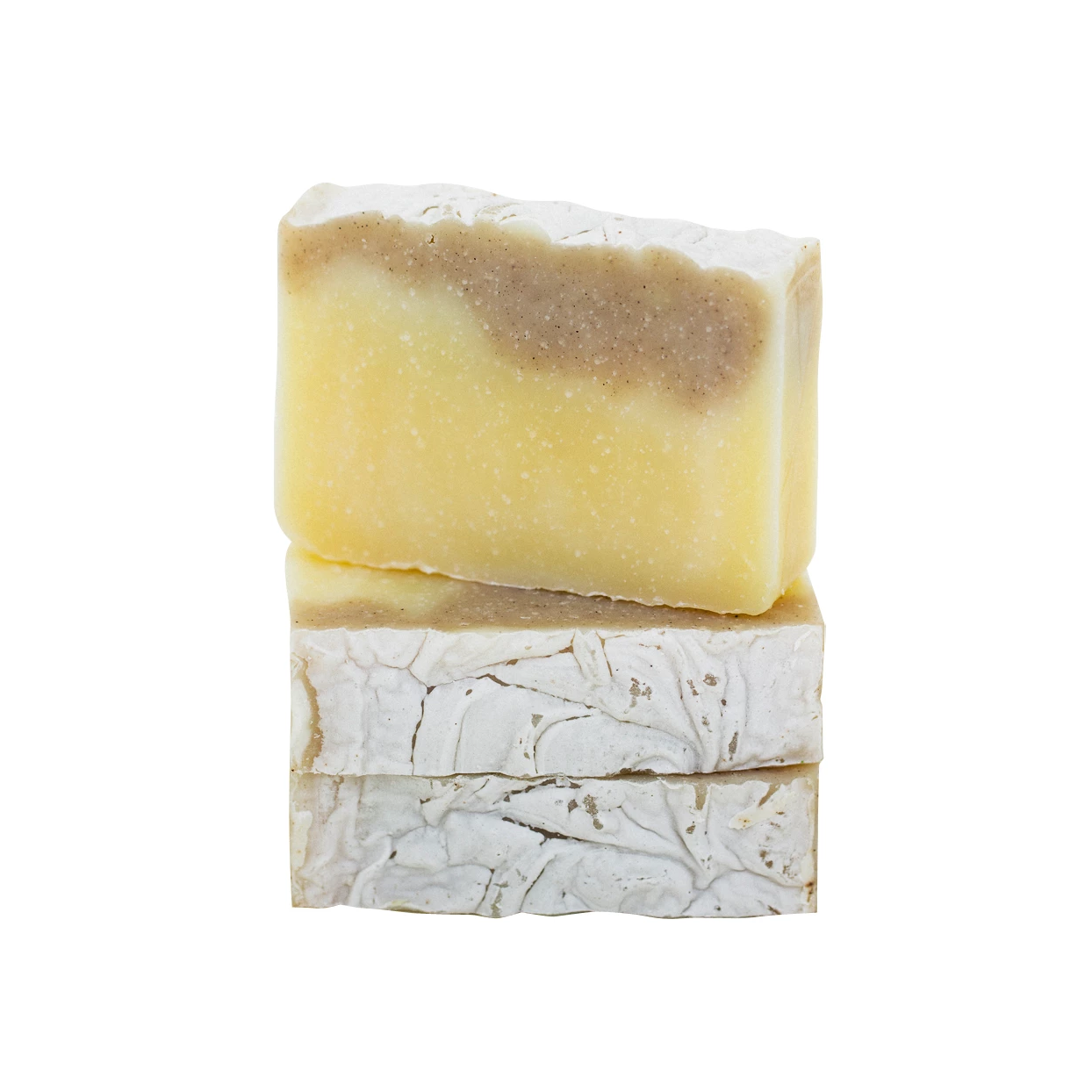 Stack of swirling cream and tan patchouli bars, handcrafted by Moxxie and all natural with added botanicals