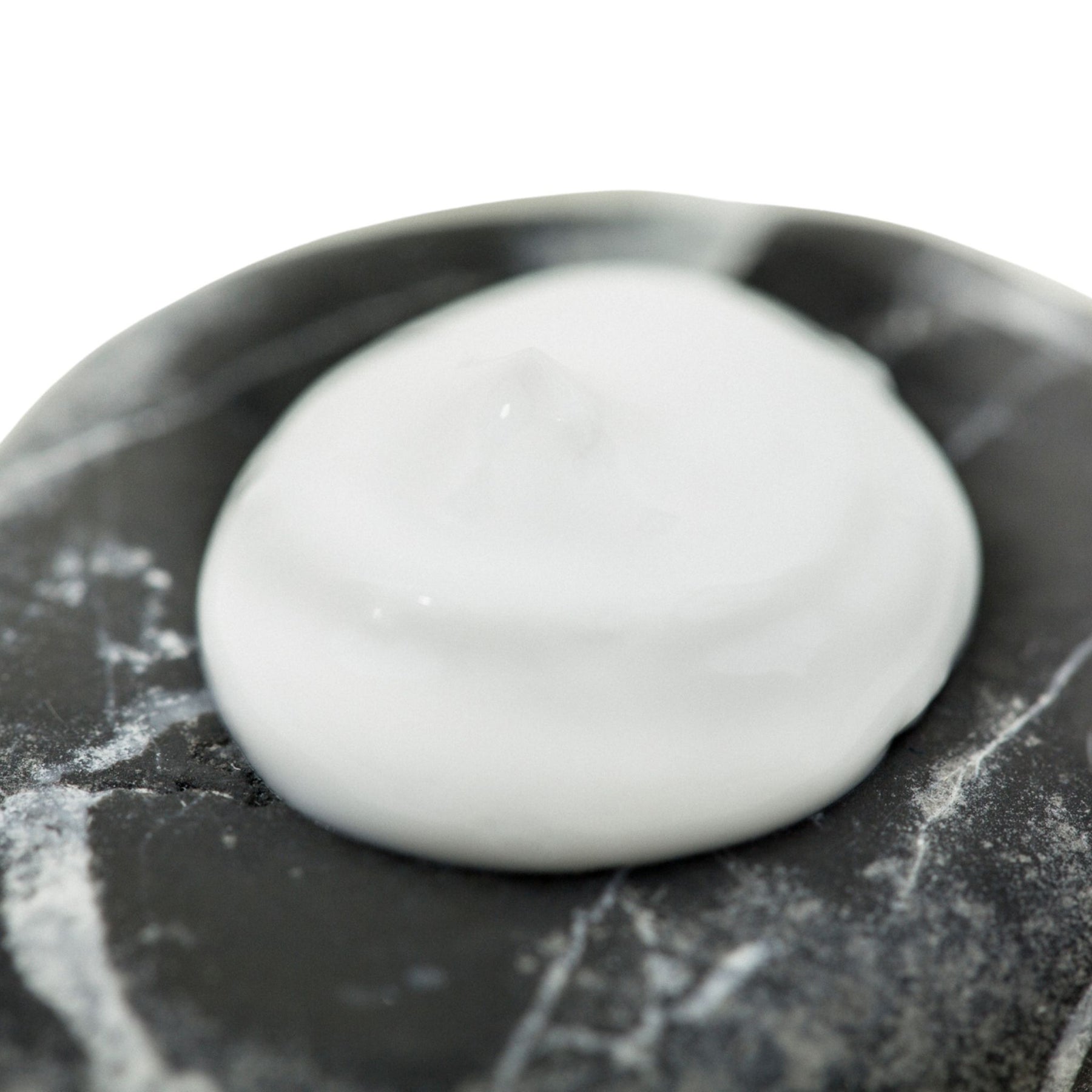 Close up of Moxxie's all natural moisturizing hand and body creme lotion in lavender scent.