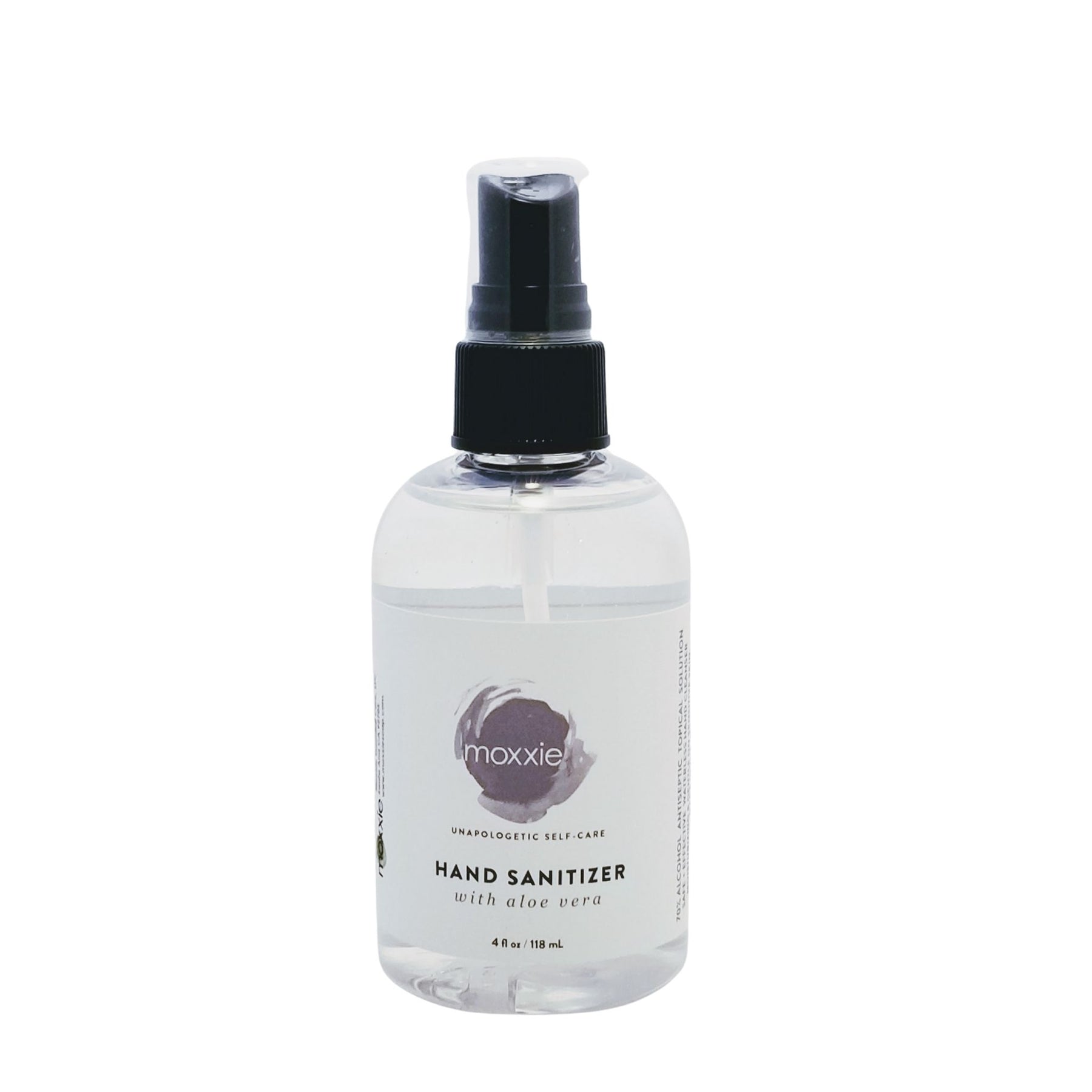 Bottle of Moxxie's skin-loving alcohol based, convenient hand sanitizer spray.  Keep your hands clean while on the go.