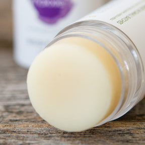 Close up of Moxxie's solid lotion body balm stick