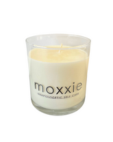Moxxie Essential Care hand-poured candle made from 100% soy wax with a cotton fiber lead-free wick and honestly fragranced with a blend of pure essential oils. 