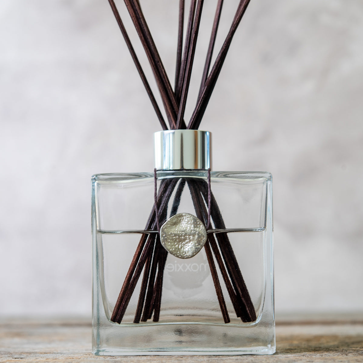 Moxxie's all natural reed diffuser bottle, scented with pure essential oils in the USA