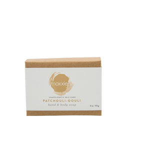 Moxxie's all natural, handcrafted Patchouli bar soap packaged in a kraft box with an ivory label.
